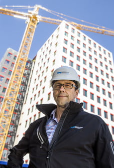 Dette billede illustrere Knauf Insulation – Certificering af transport af løsuld i præfabrikerede elementer