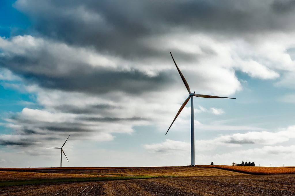 Dette billede illustrere Investering i grøn energi minimerer elpriser