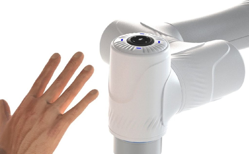Dette billede illustrere DOBOT SafeSkin sikrer kollisionsfrit samarbejde mellem robot og menneske