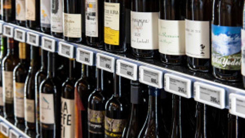 Dette billede illustrere Delfi – Elektroniske hyldeforkanter hos Nomas burgerbar POPL