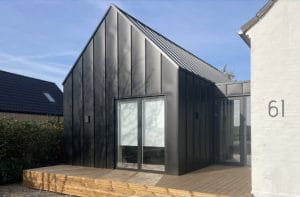 Skab et ensartet udtryk med samme profil på tag og facade